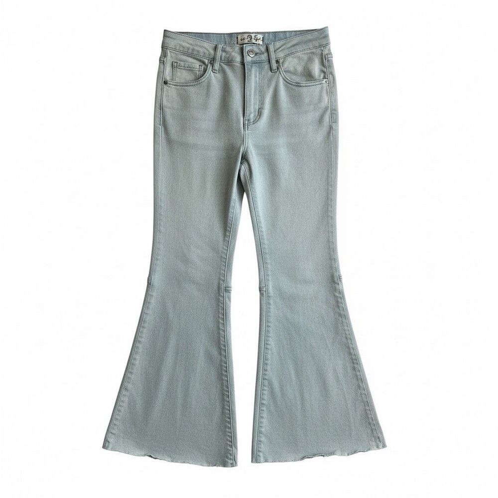 We The Free FP 25 light wash mid-rise flare Raw Hem Jeans